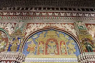 Vitthala surmontant le trône. Fresque de la période marathe (entre le XVIIe&nbsp;siècle et le XIXe&nbsp;siècle) peinte dans la salle du darbâr au Palais de Tanjore.