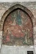 Peinture représentant "Vierge en gloire entourée d'anges avec deux saints personnages en prière" (Début du XVIe&nbsp;siècle).