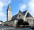 L'église Saint-Samson. Vue extérieure sur le chevet et le cloître.