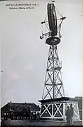 « Eolienne, Mairie et Ecoles »