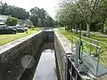L'écluse de Gouarec, dite écluse de la Villeneuve (écluse no&nbsp;140 du canal de Nantes à Brest).
