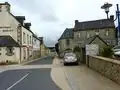 Rue principale du bourg (en direction de Berrien).