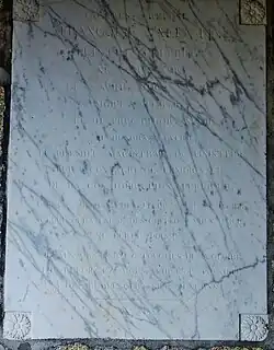 Épitaphe à la mémoire du peintre François Valentin qui se trouve dans le porche de l'église