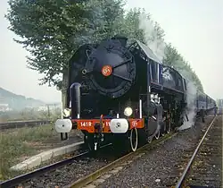 Un train à vapeur en gare de Peyraud avant l'électrification.