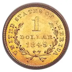 Pièce de monnaie en or avec les inscriptions 1 dollar, 1849 et UNITED STATES OF AMERICA ainsi qu'une couronne de lauriers ouverte.