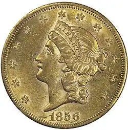 Pièce de monnaie comprenant le profil gauche d'un femme aux cheveux longs, portant un diadème avec l'inscription « Liberty ». Treize étoiles et la date, 1856.