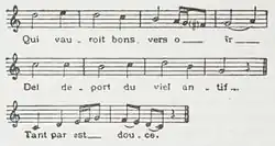 Partition musicale montrant 3 portées suivies chacune d’un texte.