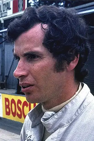 Photo de profilde Dieter Glemser en combinaison de pilote.