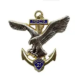 Insigne de la 1re compagnie de combat datant de 1998 (avant l'insigne comportait un globe terrestre).