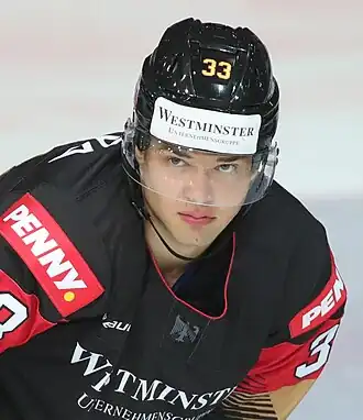 Photographie couleur d'un joueur de hockey sur glace