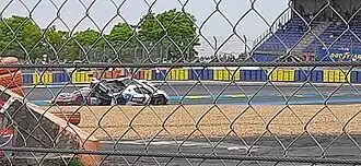 Un instant du crash entre Gino‑Generoso Forgione (Ferrari n°21) et Josep Mayola Comadira (Ferrari n°23)