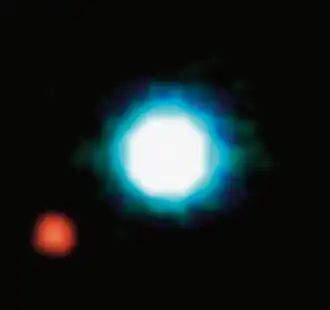 La naine brune 2M1207 (bleu)et son compagnon 2M1207 b (rouge)par l'Observatoire européen austral.