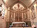 Le maître-autel et son retable.