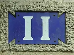 Plaque de métal émaillé de 1911.