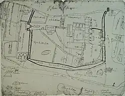 Plan grossier en noir et blanc indiquant l'emplacement des divers bâtiments d'une abbaye et des cultures environnantes
