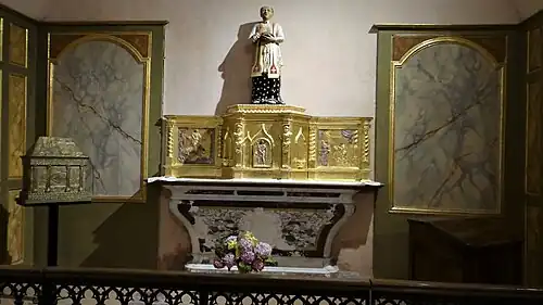 Statue de saint Papoul, reliquaire et tabernacle.