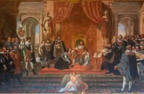 Un homme vêtu d'un manteau royal et portant un sceptre est assis sur un trône, tandis qu'il reçoit un baisement de la part d'un autre homme en habit de cour. Une assemblée nombreuse regarde la scène