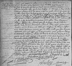 Texte manuscrit en noir sur fond gris