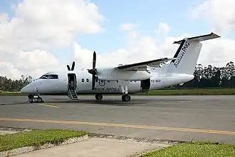 Un De Havilland Canada DHC-8-100 de Airlines PNG, similaire à celui impliqué dans l'accident.
