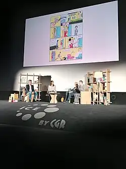 Conférence de presse réunissant Gauthier Van Meerbeeck (directeur éditorial des éditions Le Lombard, à gauche), Aurélie Blonde (présentatrice, au centre) et Dany au festival d'Angoulême 2023.