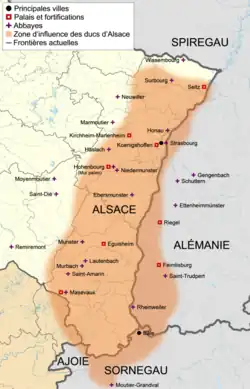 Carte de l'Alsace représentant un territoire avec des bordures imprécises et marqués par des symboles pour localiser des abbayes et des palais.