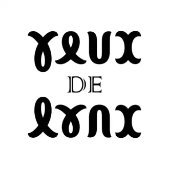 L'expression « yeux de lynx », ambigramme calligraphié par symétrie miroir d'axe horizontal.