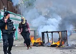 La photographe de presse Heba Khamis lors d'affrontements entre la police égyptienne et les Frères musulmans dans la région de Sidi Bishr à Alexandrie en Égypte.
