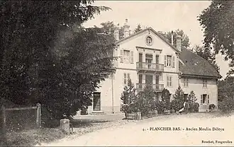 La maison de la famille Desloye-Terré, dans le centre de Plancher-Bas, au début du XXe&nbsp;siècle.
