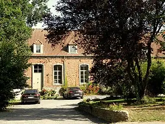 Ferme Blondain, corps de logis, avec ses linteaux surbaissés à clef.