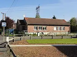 Des habitations post-Nationalisation groupées par deux.