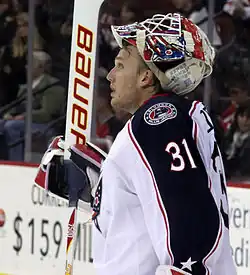 Photographie couleur d'un joueur de hockey sur glace