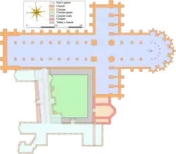 Plan en couleur d'un monastère doté d'une église très vaste et d'une cloître irrégulier.