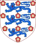 Blason depuis 1949: D'argent à trois lions d'azur armés et lampassés de gueules posés l'un sur l'autre accompagnés de 10 roses du même ordonnées 3,3,3 et 1.