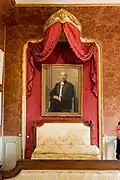 Chambre avec portrait d'Edmond Rostand.