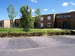 Stationnements perméables et logements en bois, ZAC de la Garenne, 2008.
