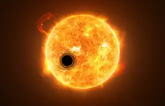 Vue d'artiste de l'exoplanète WASP-107 b  devant son étoile.