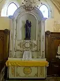 Autel et retable de la Vierge.