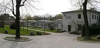 Jardin d’enfants « Schweizerspende [Donation suisse] » (1945), Auer-Welsbach-Park, à Vienne 15.