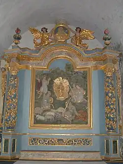Retable représentant l'apparition de la Vierge à l'Enfant à des bergers.