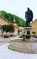 Fontaine et statue d'Hercule.