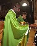 José Manuel Imbamba, durant une messe à l'église Saint-François à Lodi, le 23 août 2015.