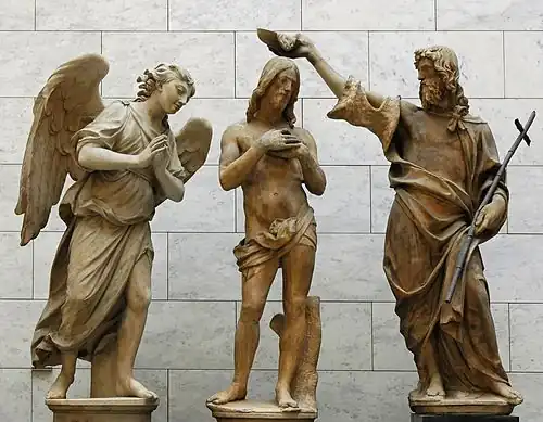 Andrea Sansovino, le  Baptême, 1501-1504,	au-dessus de la Porte du Paradis. L'ange est une œuvre ultérieure d'Innocenzo Spinazzi.