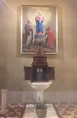 Les fonts baptismaux de l'église paroissiale de Saint-Barthélemy, à Marne (Italie).