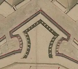 Embrasures dans les parapets des flancs et du cavalier d'un bastion à orillons du 1er système Vauban.