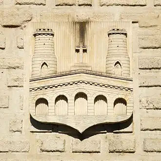 Le blason de la ville représentant le Pont Tibère, le beffroi et la «&nbsp;Gleizette&nbsp;».