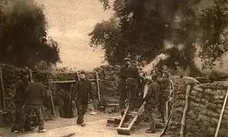 Canon de la défense d'Anvers en action (1914).