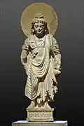 Le bodhisattva de l'avenir, Maitreya debout. Schiste, H. 85&nbsp;cm. Ier – IIIe&nbsp;siècle. Shahbaz-Garhi. Musée Guimet