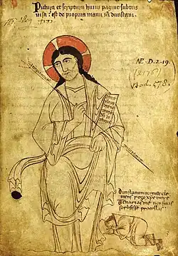 Dessin au trait d'un homme assis, vêtu d'une grande robe, avec un halo autour de la tête. Un minuscule moine se prosterne à ses pieds.