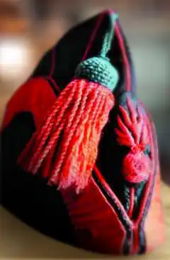 Bonnet de police de sapeur pompier à gland rouge, début XIXe&nbsp;siècle.