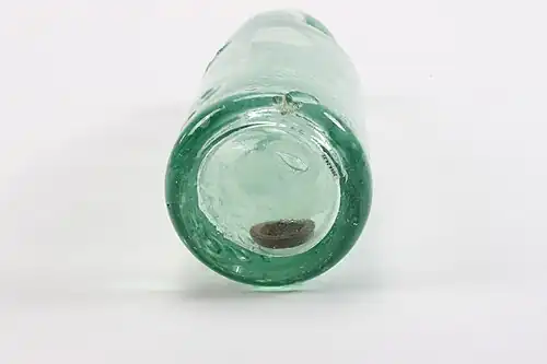 Le joint tombé au fond de la bouteille